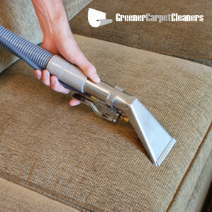 Steam cleaning a sofa as part of our upholstery cleaning service in Melbourne
